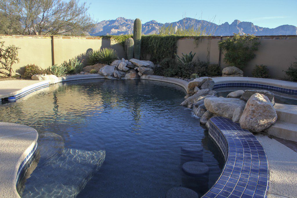 A house with a pool in the backyard