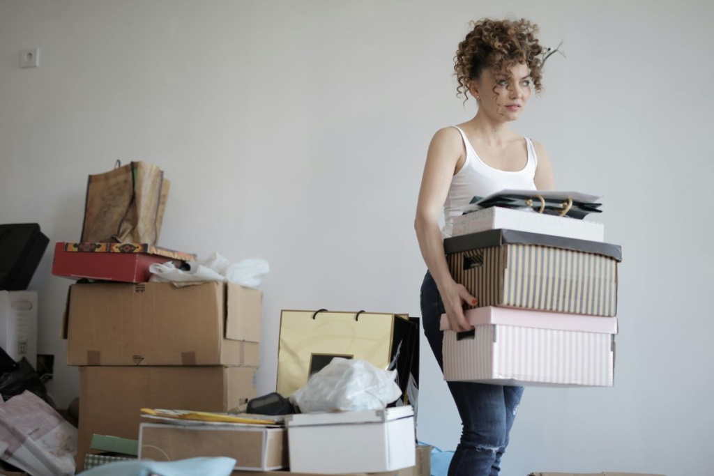 A woman organizing her belongings for a move